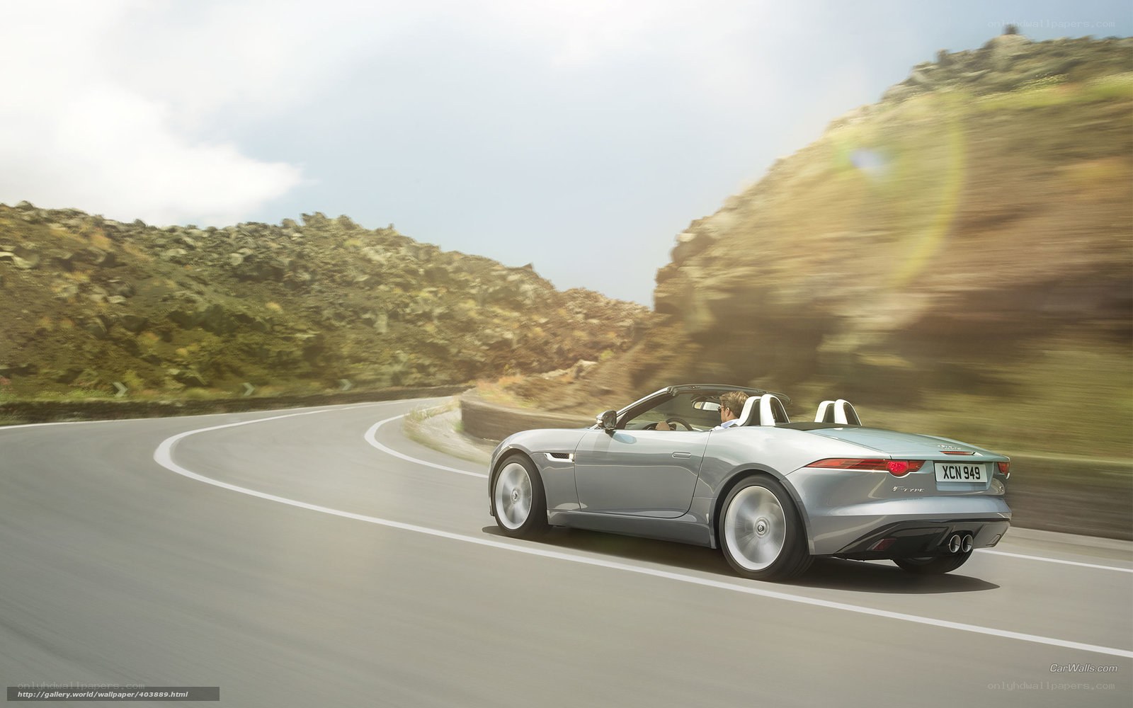 Jaguar F-Type convertible on winding road