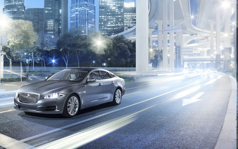 Jaguar luxury sedan at night