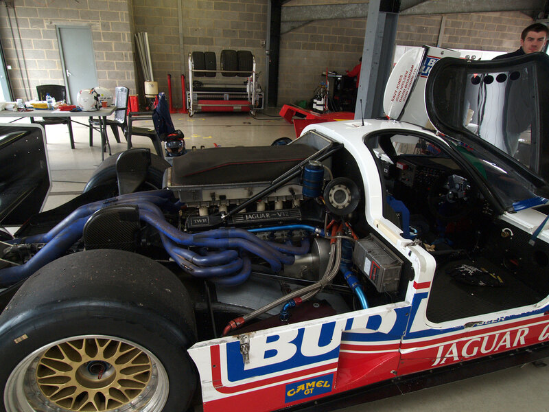 Jaguar race car in garage