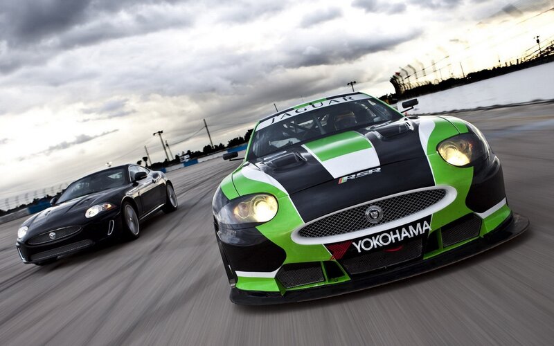 Jaguar race cars on track