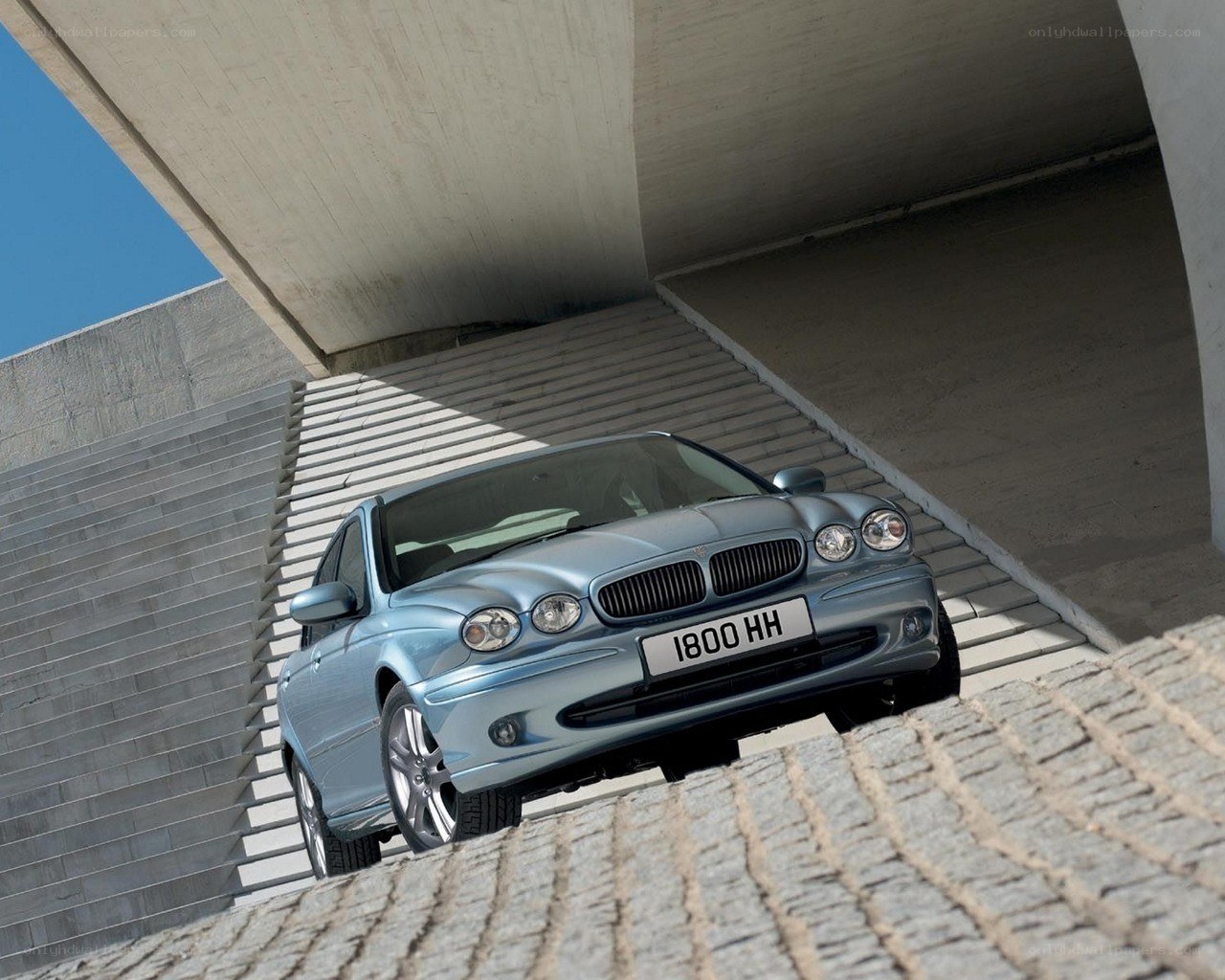Jaguar S-Type on concrete stairs