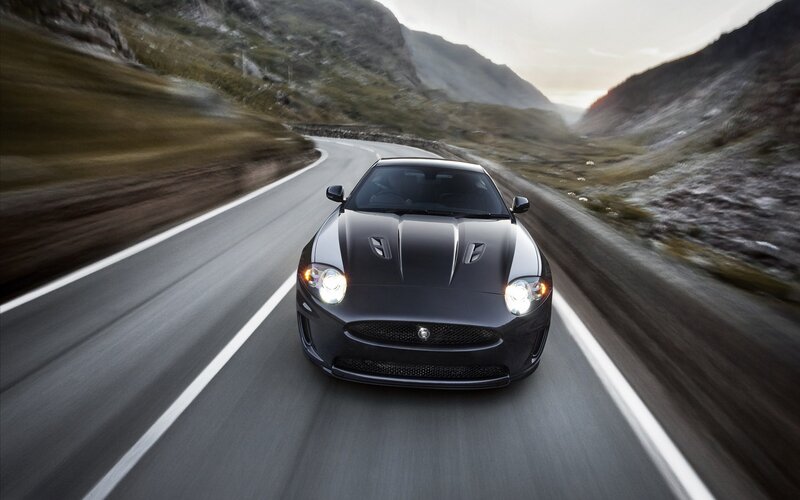 Jaguar sports car on mountain road