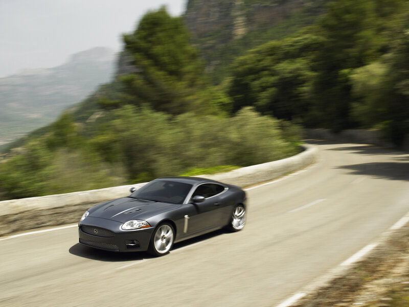 Jaguar sports car on winding road