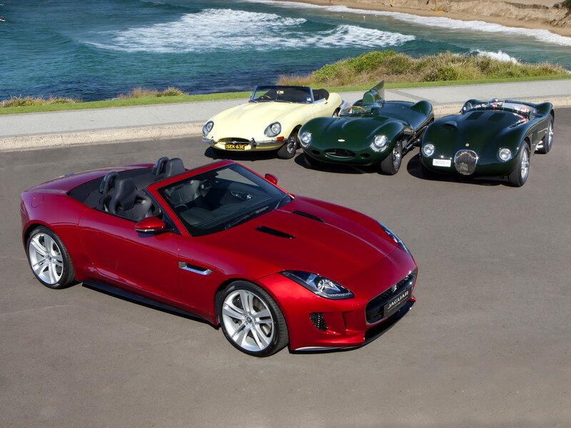 Jaguar sports cars by the sea