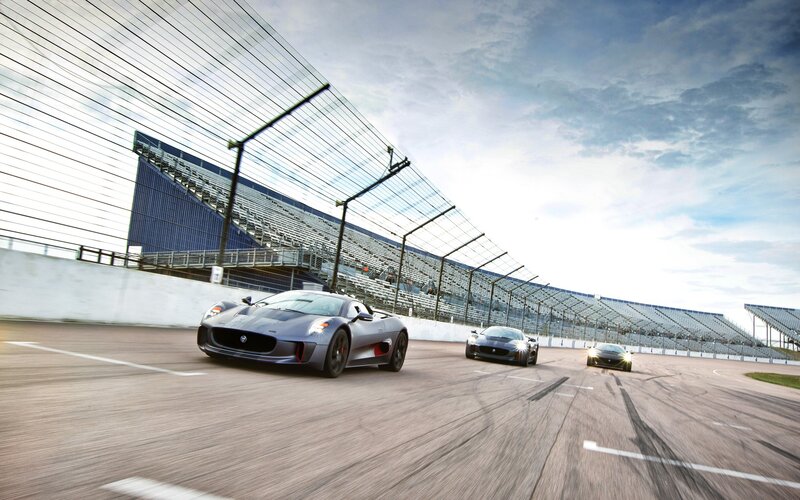 Jaguar sports cars on a racetrack