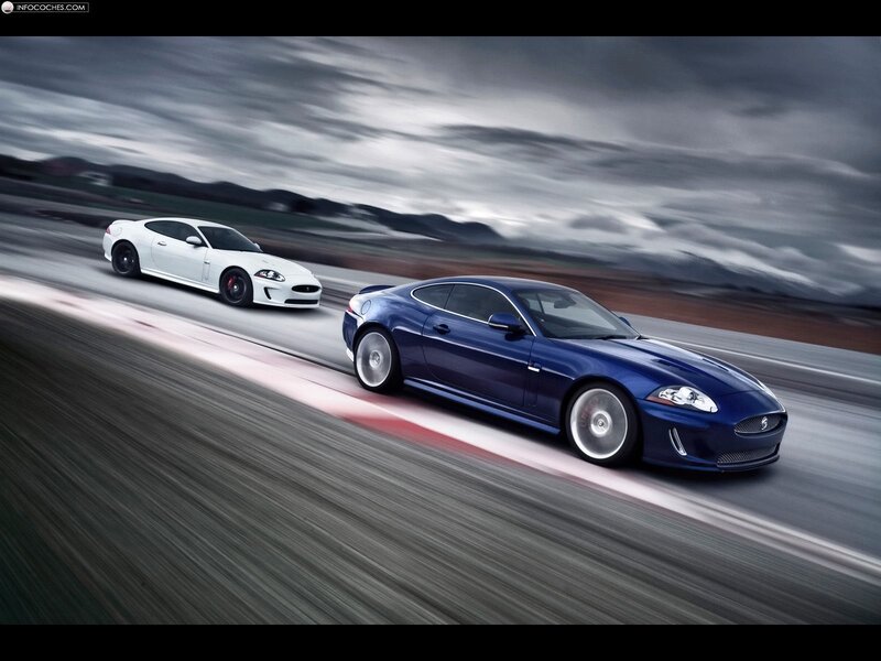 Jaguar sports cars on a racetrack