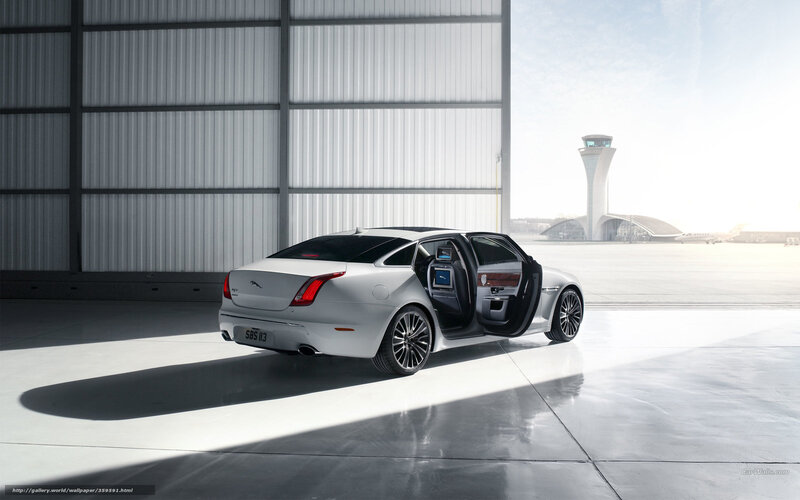 Jaguar XJ at airport hangar