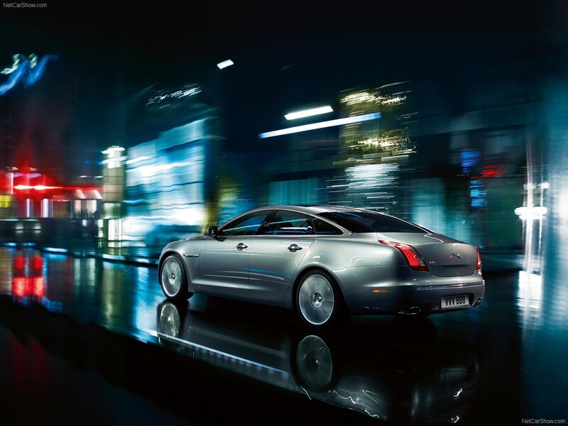 Jaguar XJ in city at night