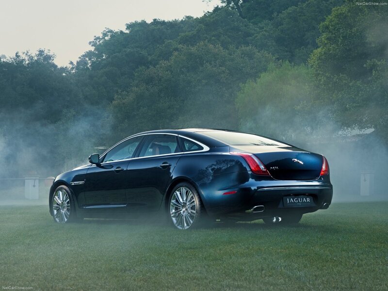 Jaguar XJR on a misty lawn
