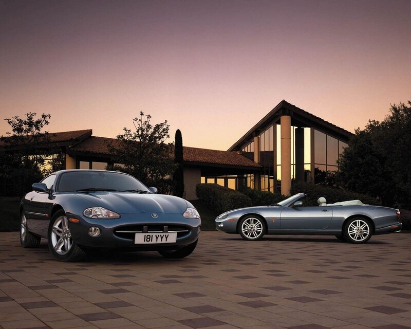 Jaguar XK cars at sunset