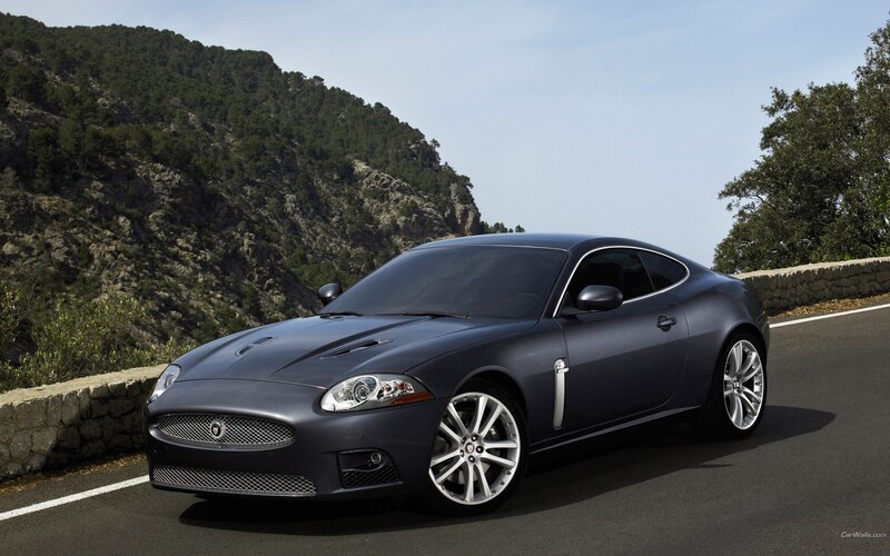 Jaguar XK on a mountain road