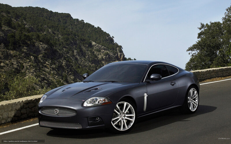 Jaguar XK on a mountain road