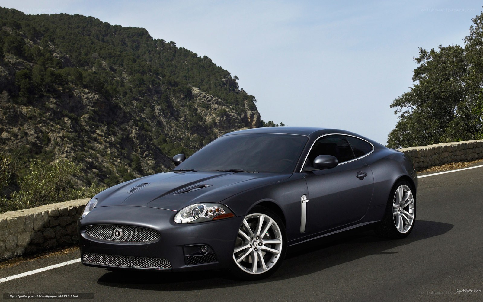 Jaguar XK on a mountain road