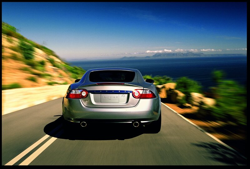 Jaguar XKR driving on coastal road