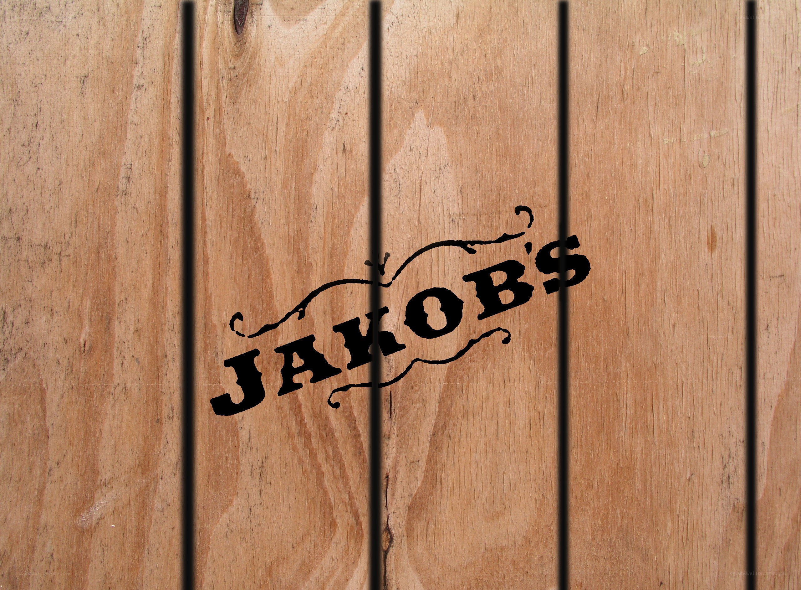 Jakob's logo on wood