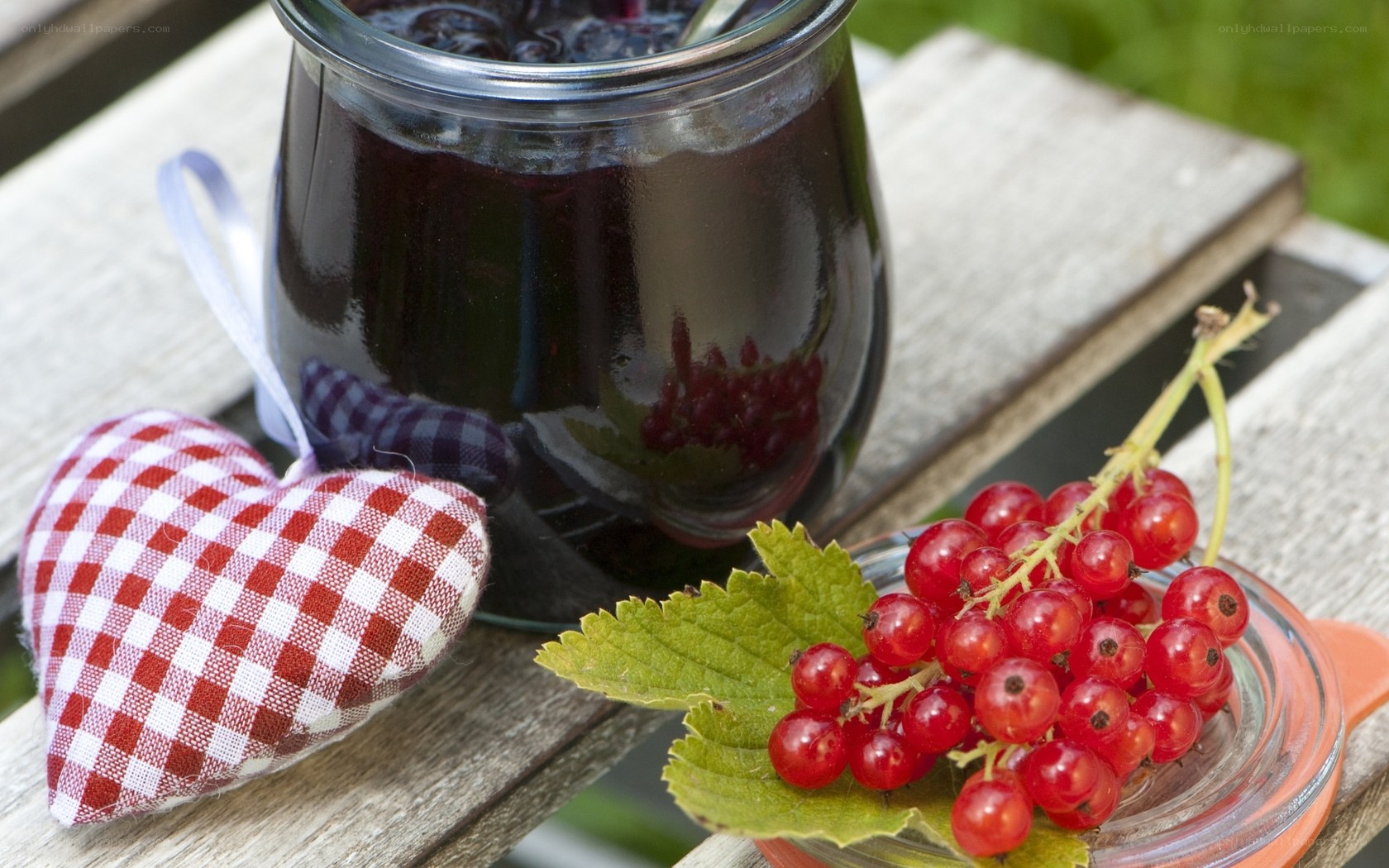 Jam and red currants on a table