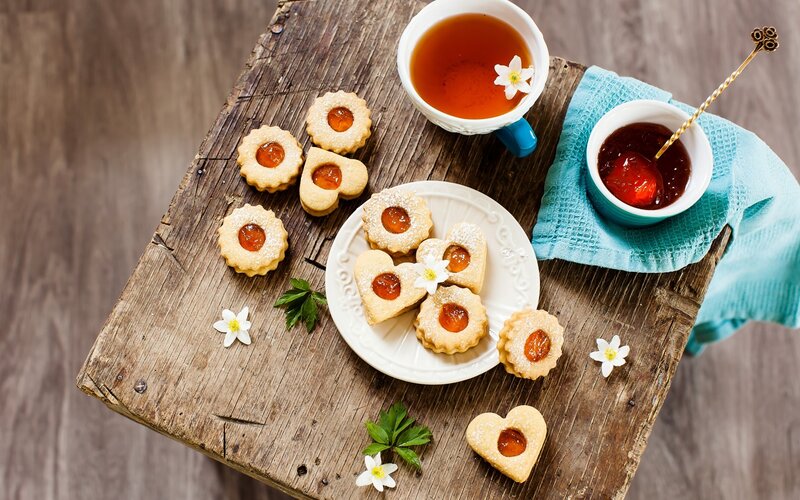 Jam-filled Cookies on Wood