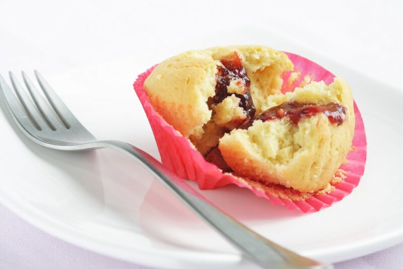 jam-filled muffin on plate