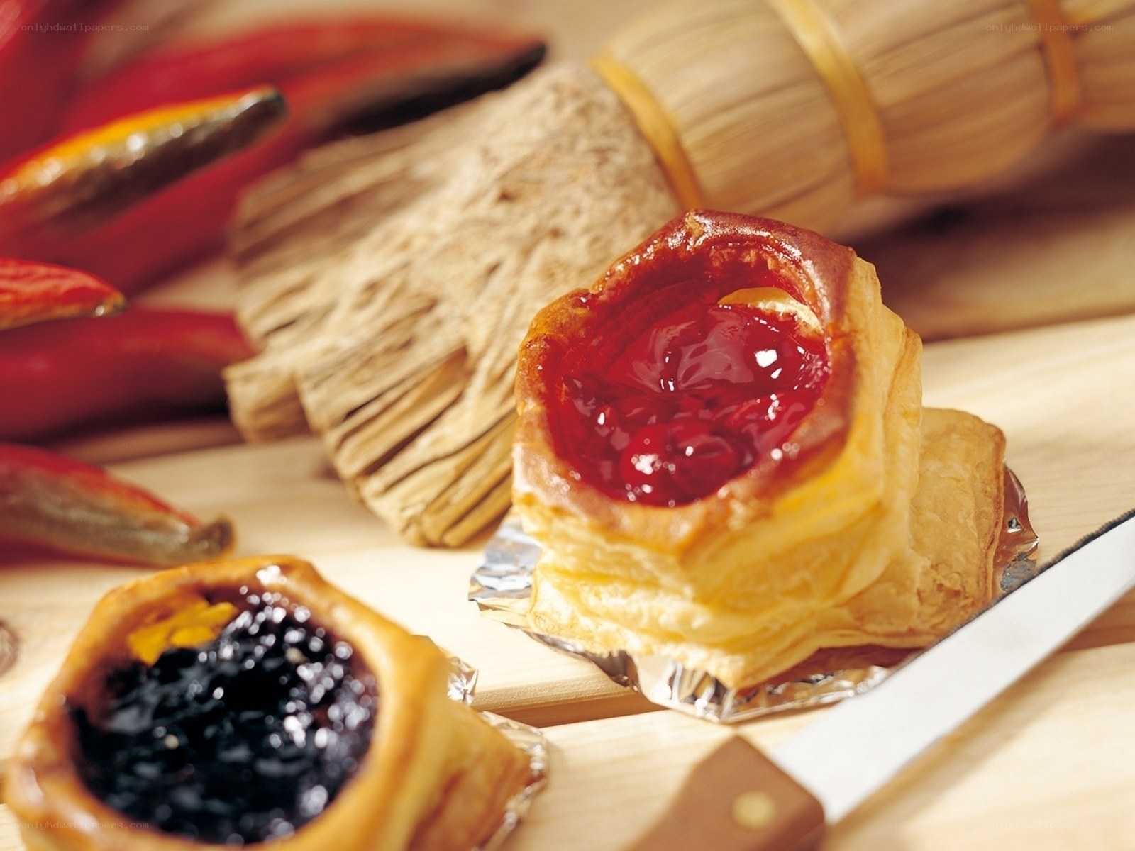 jam-filled pastries on wood