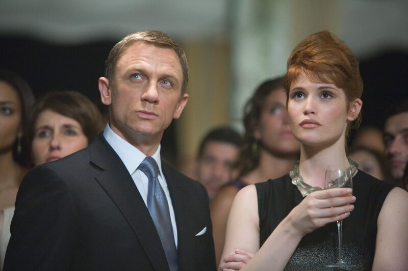 James Bond and a woman at an event