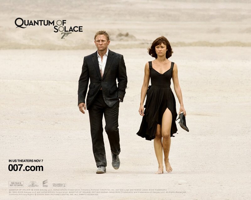 James Bond and a woman in desert