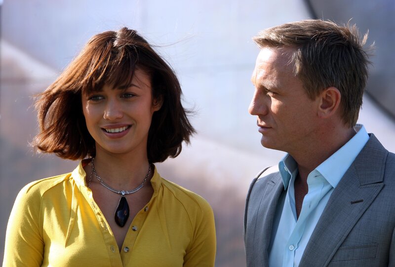 James Bond and a woman in yellow