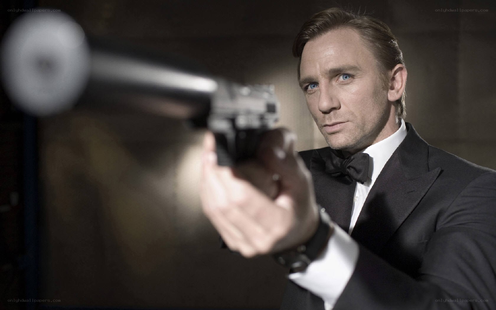 James Bond holding a gun