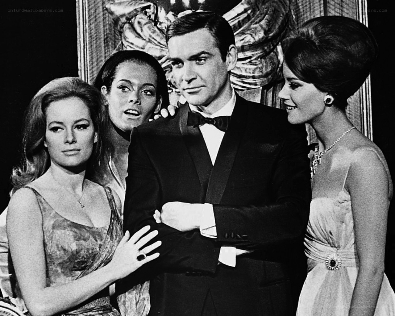 James Bond with two women
