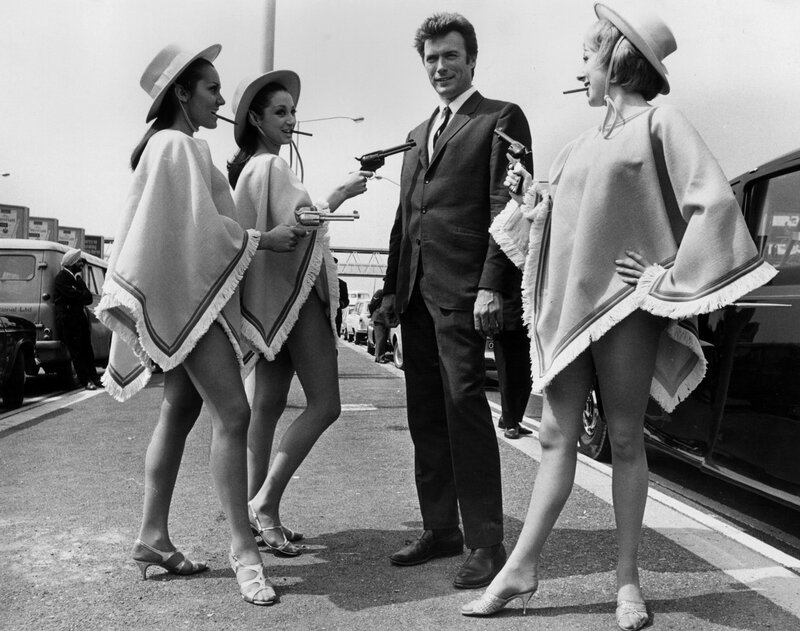James Bond with women in ponchos