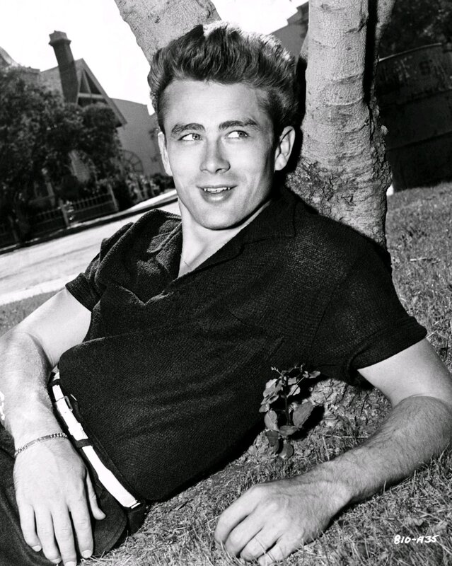 James Dean leaning against a tree