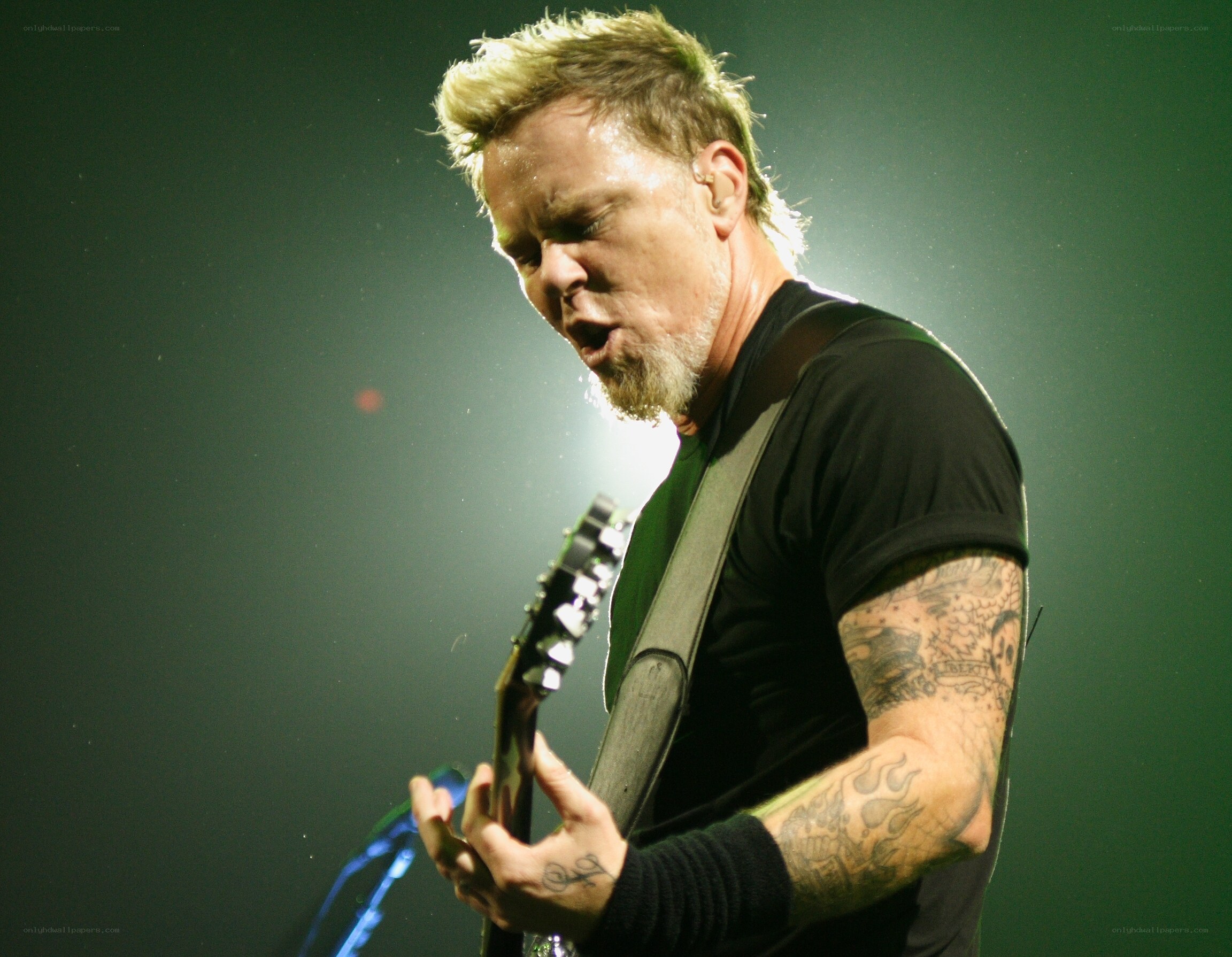 James Hetfield performing on stage