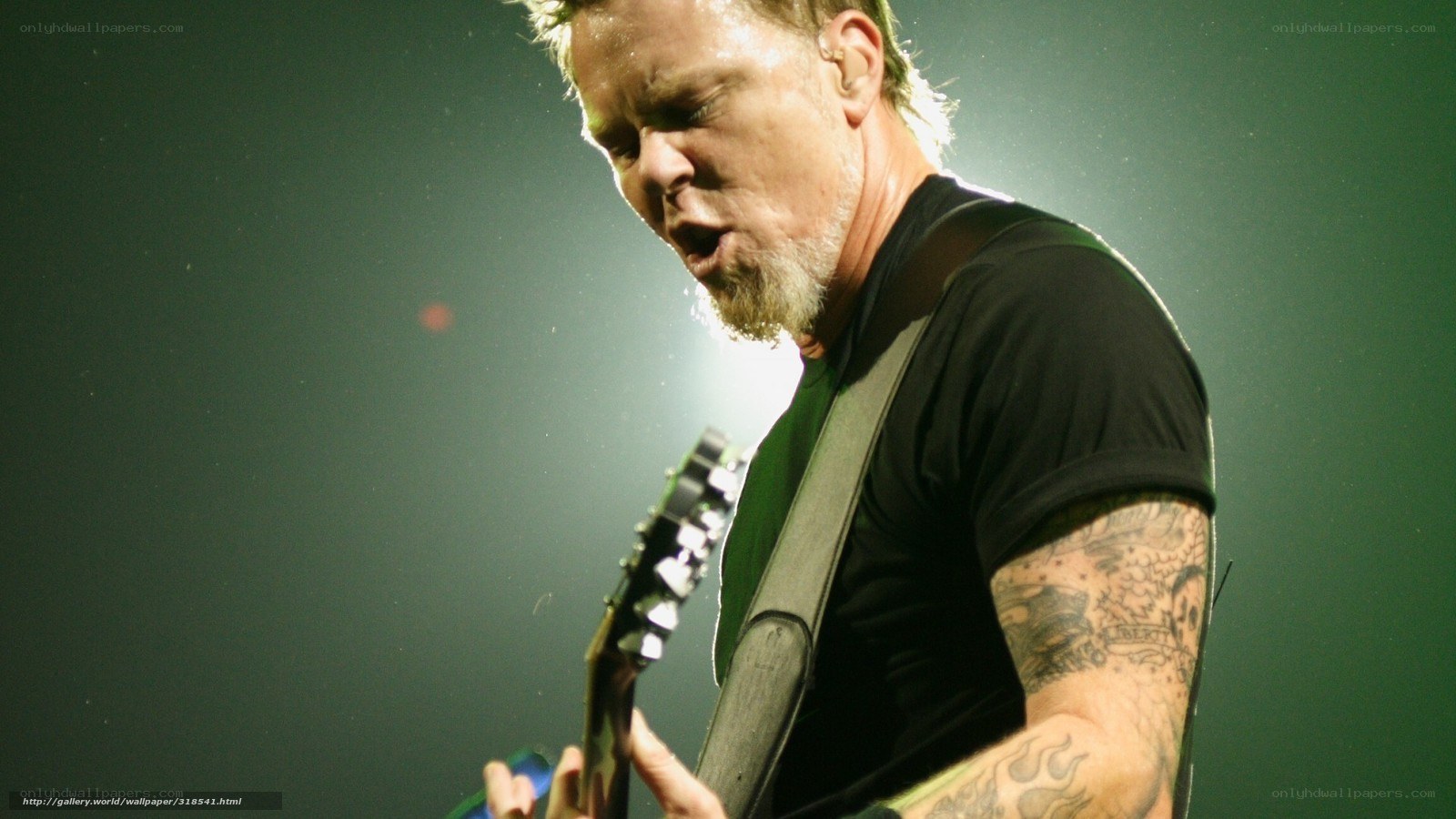 James Hetfield performing on stage