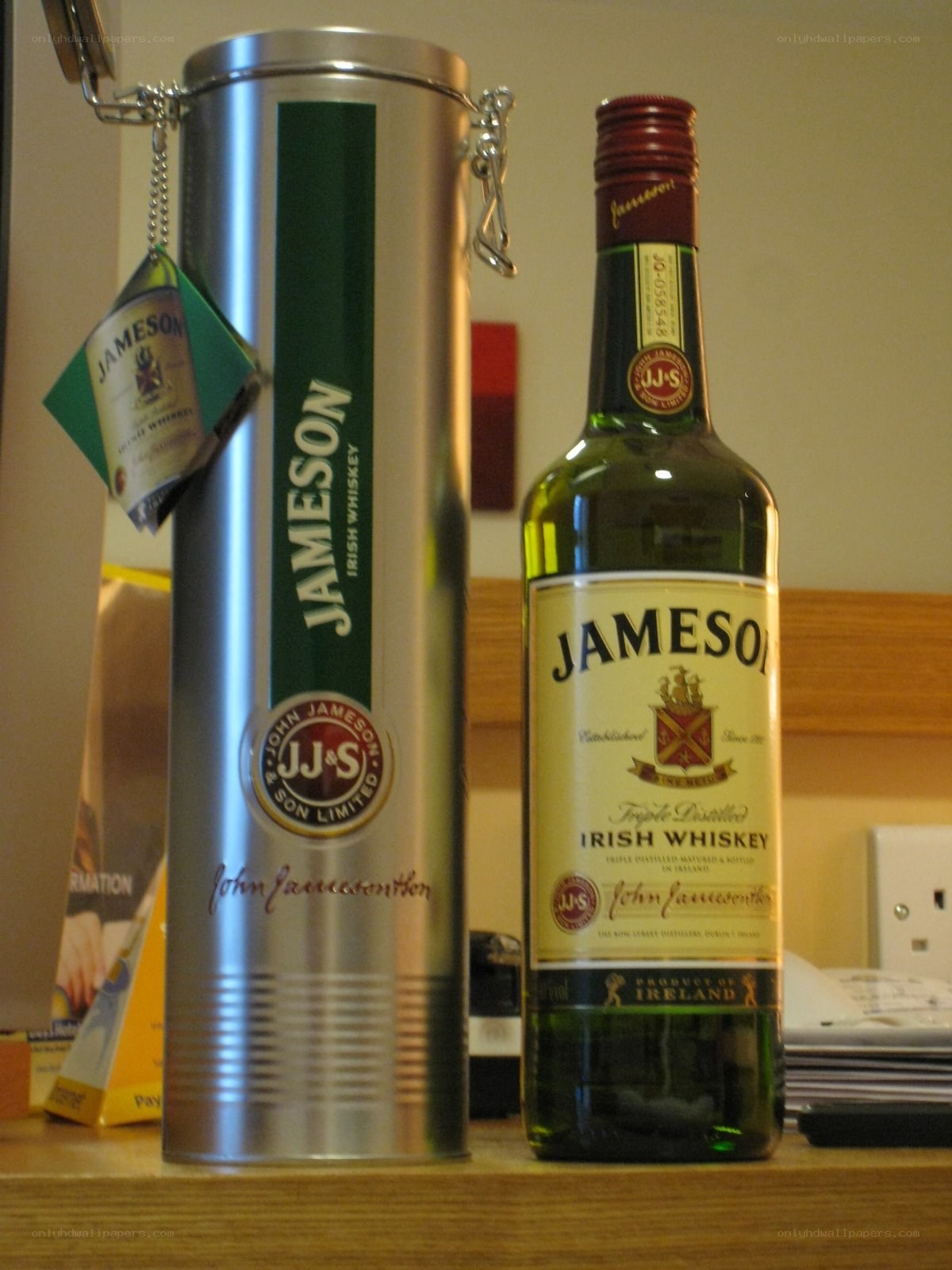 Jameson Irish Whiskey bottle and tin