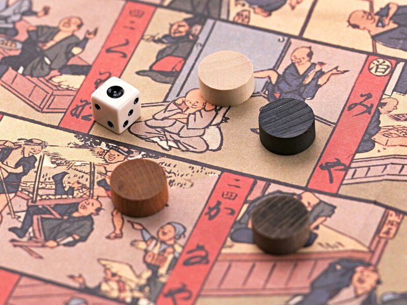 Japanese board game with dice and tokens