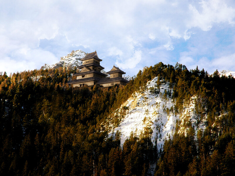 Japanese castle on a snowy mountain