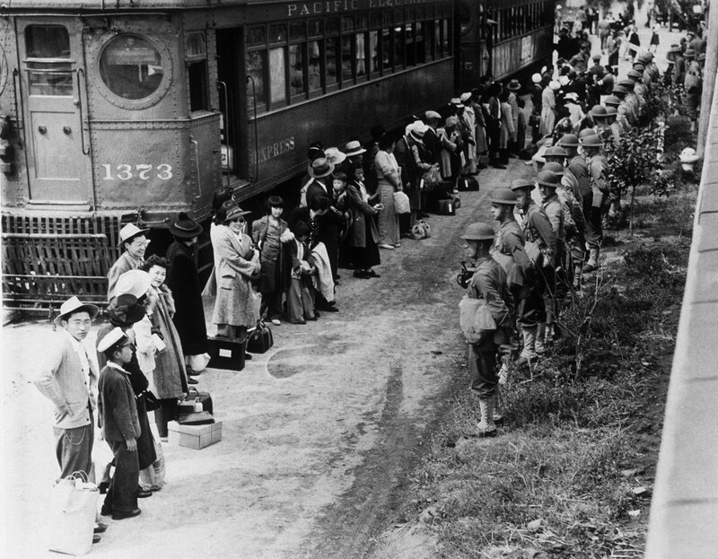Japanese civilians boarding train