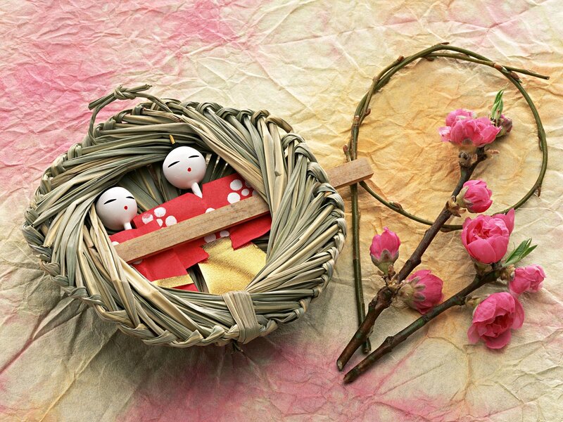 Japanese dolls in a basket