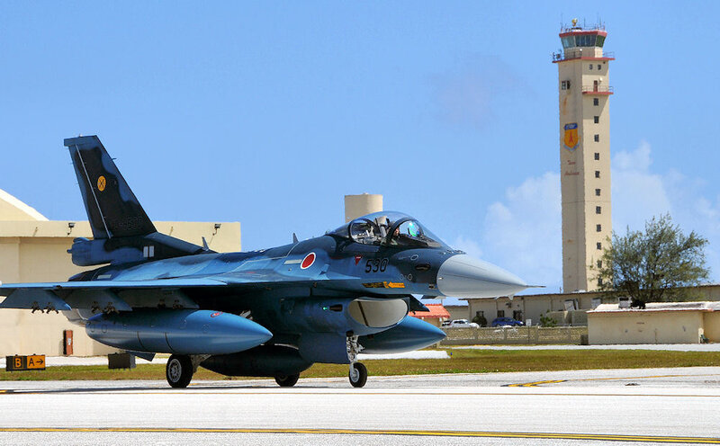 Japanese Fighter Jet on Runway — Blue