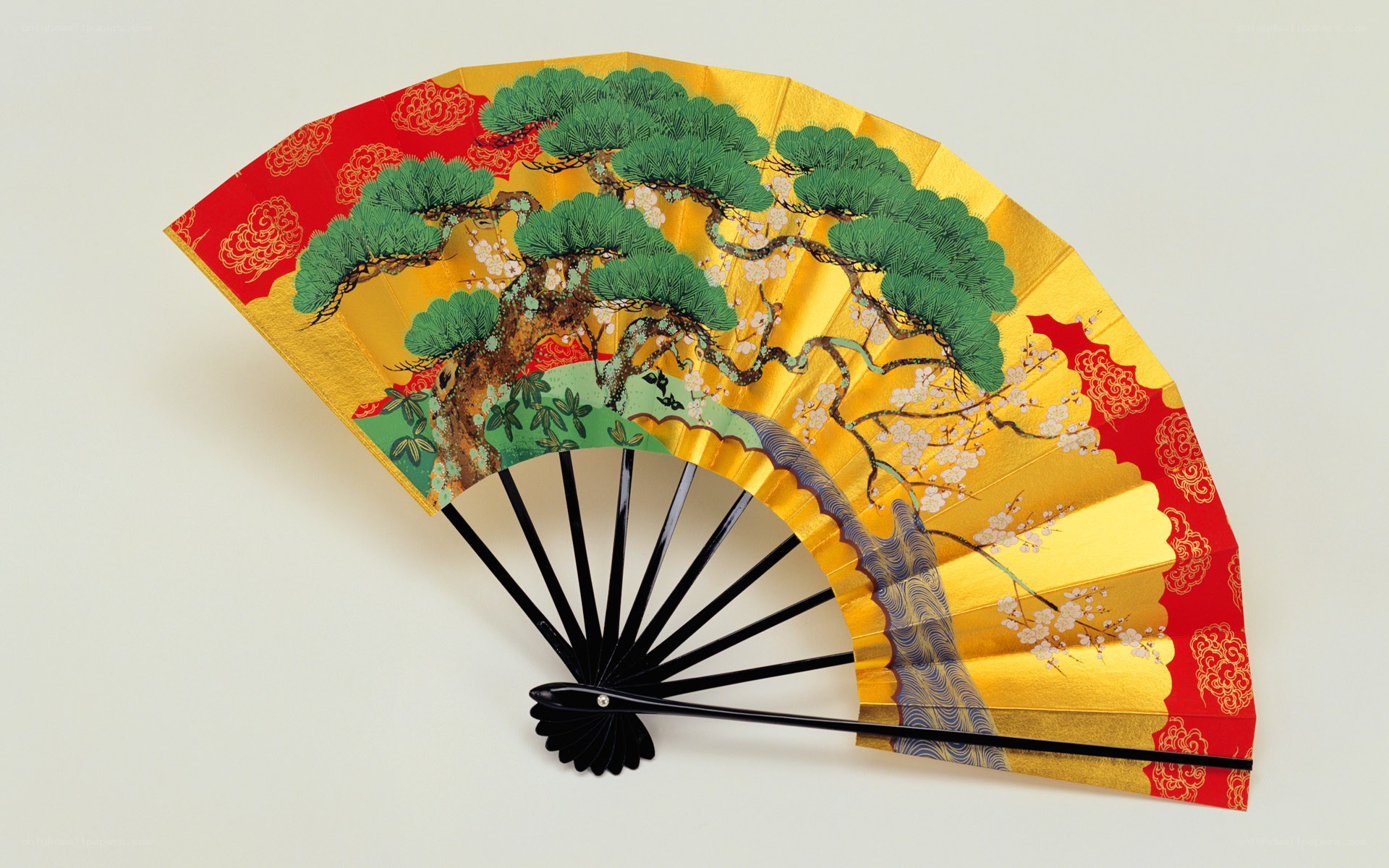 Japanese folding fan with pine tree