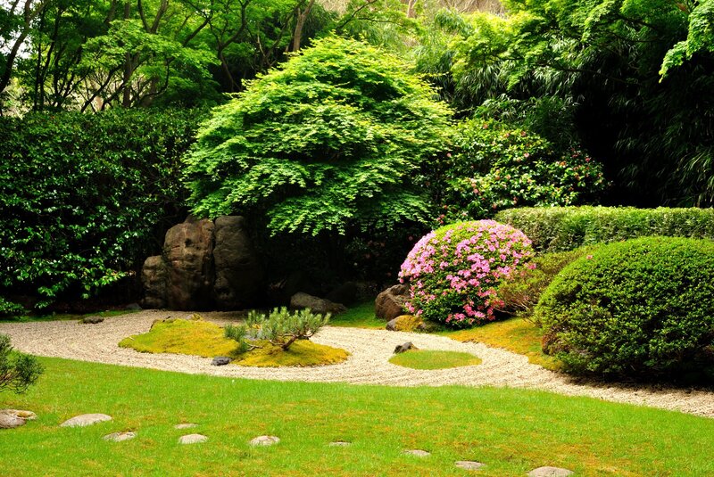 Japanese garden with gravel and flowers