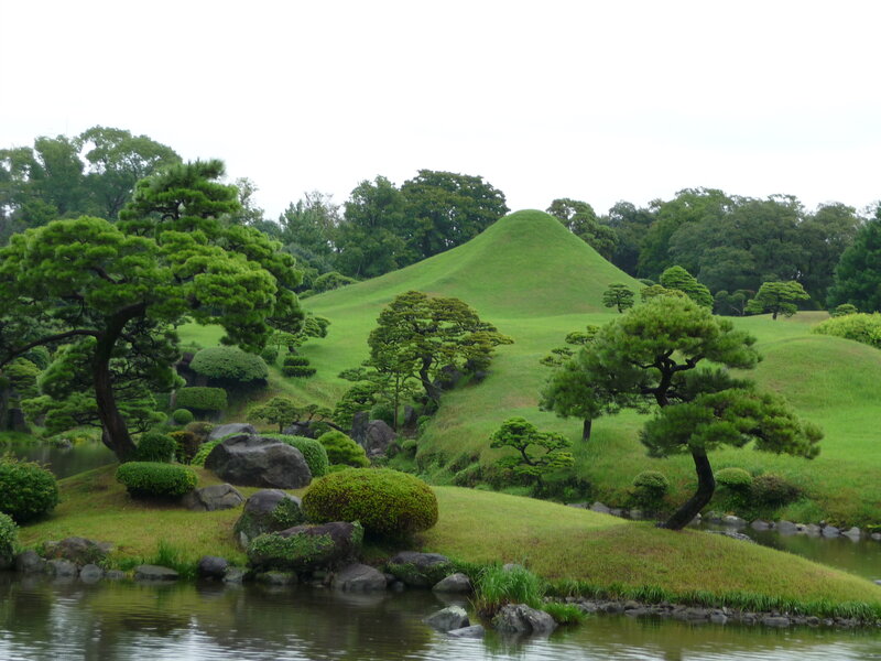 Japanese garden with green hills