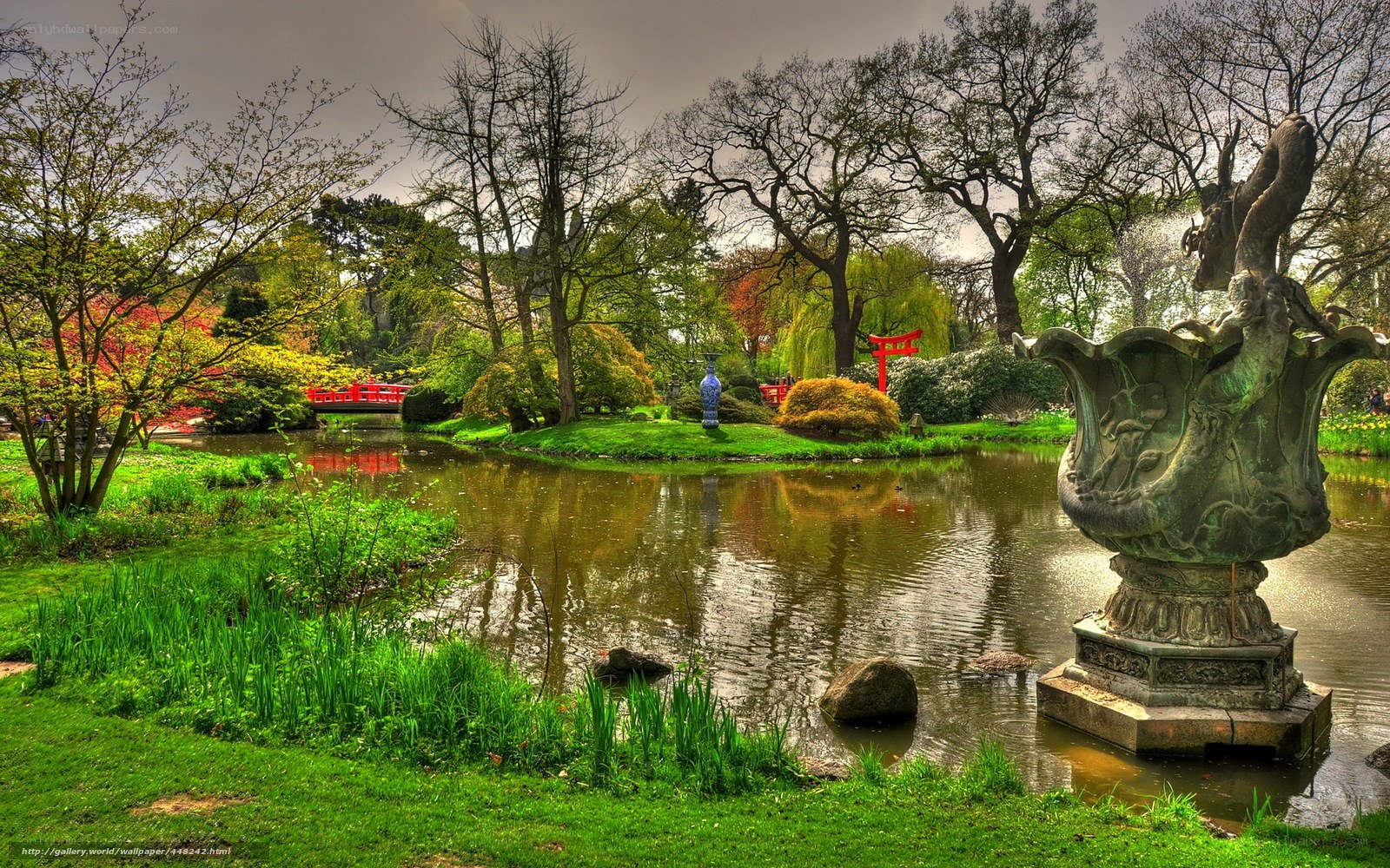 Japanese garden with pond and bridge