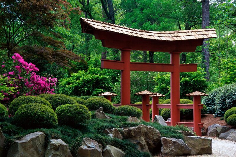 Japanese garden with red torii gate