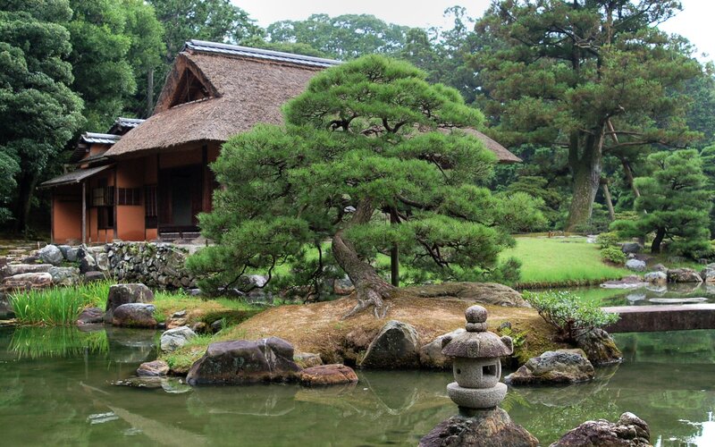 Japanese garden with thatched house