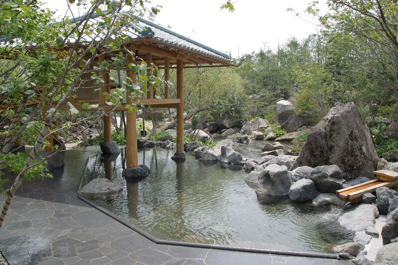 Japanese garden with wooden pavilion