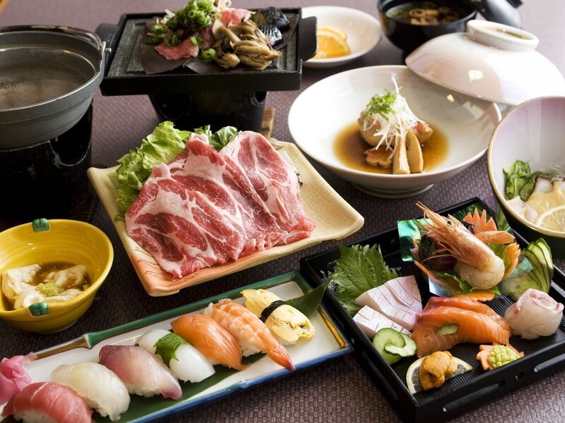 Japanese meal with sushi and meat
