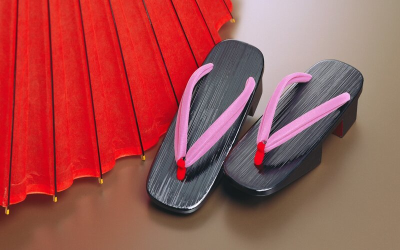 Japanese sandals and red umbrella