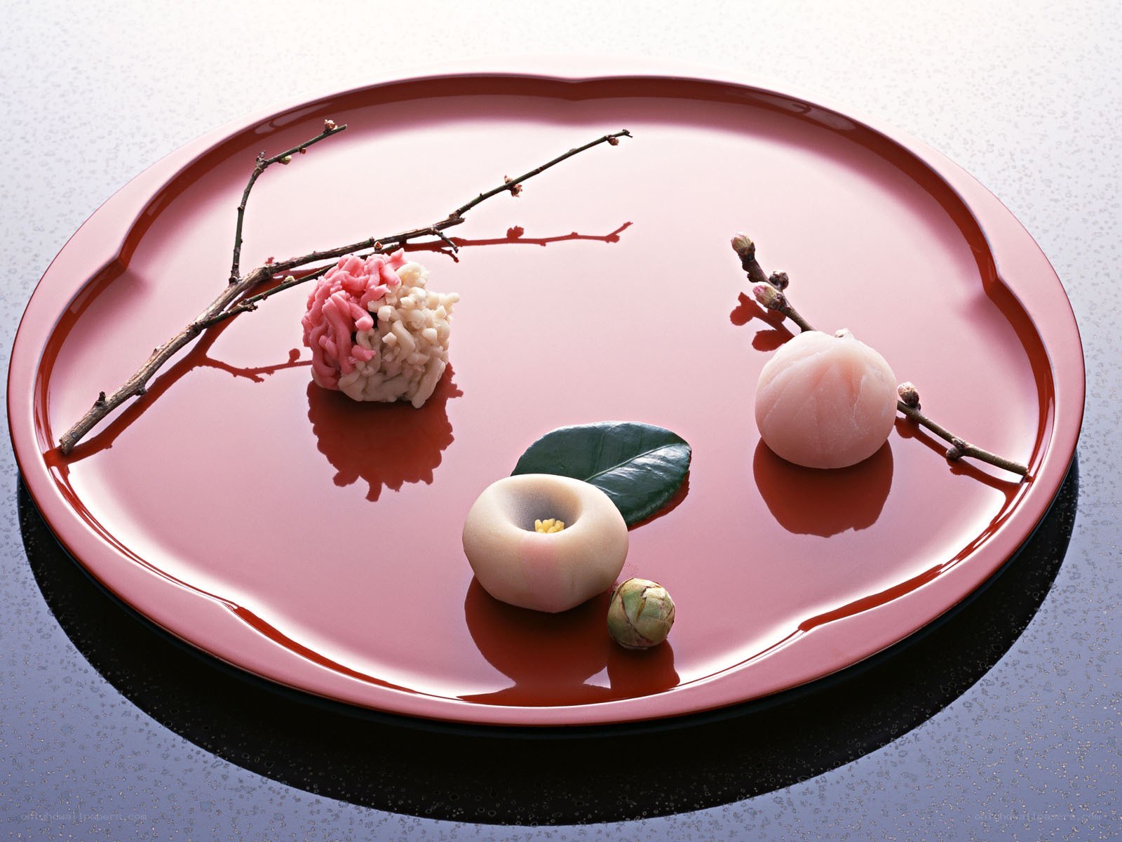 Japanese sweets on a red plate