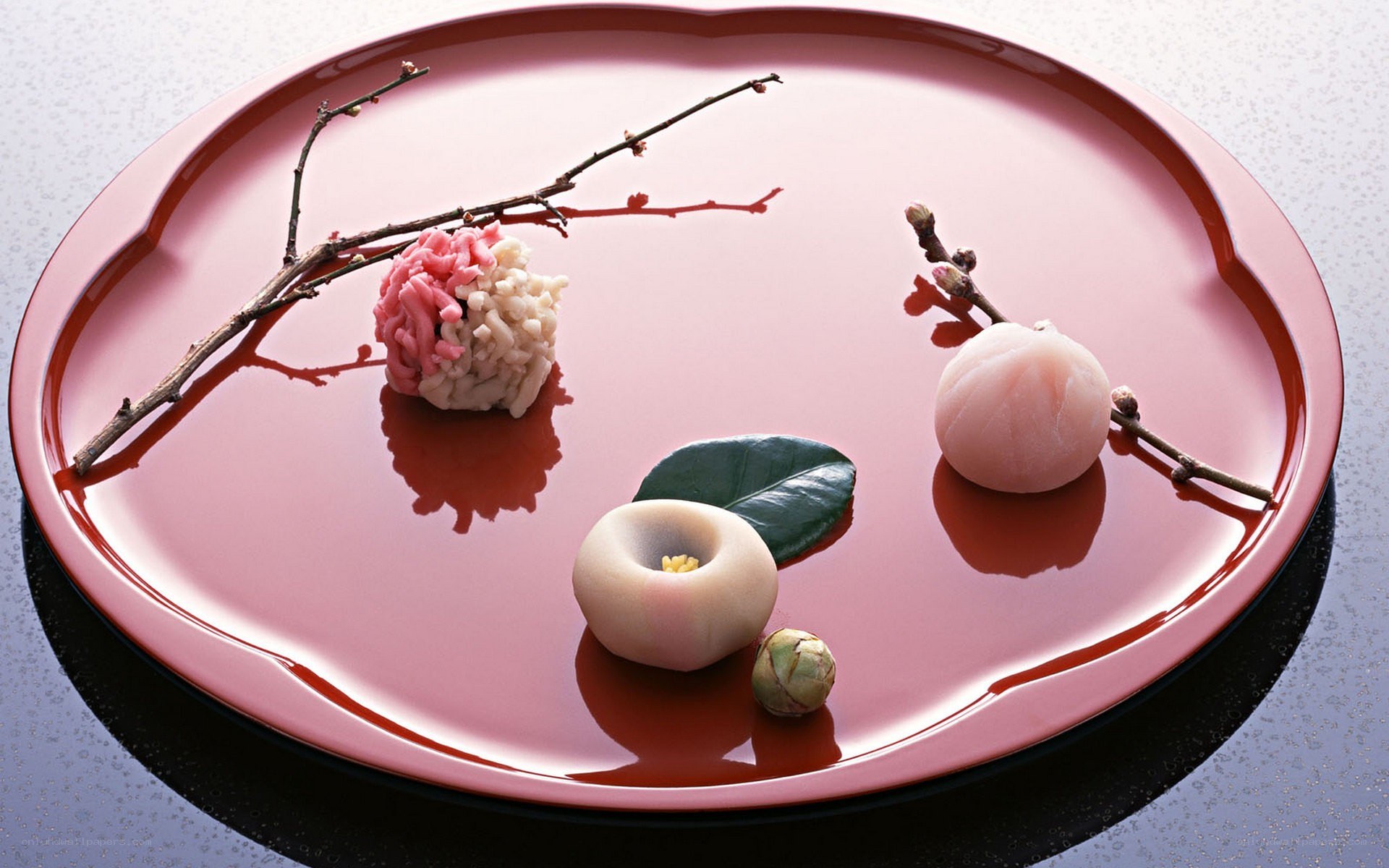 Japanese sweets on a red plate