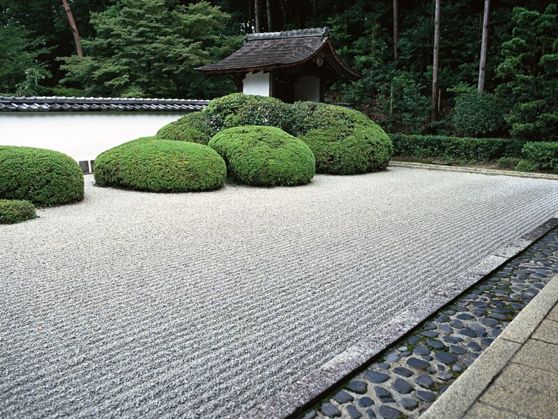 Japanese Zen garden with gravel and shrubs